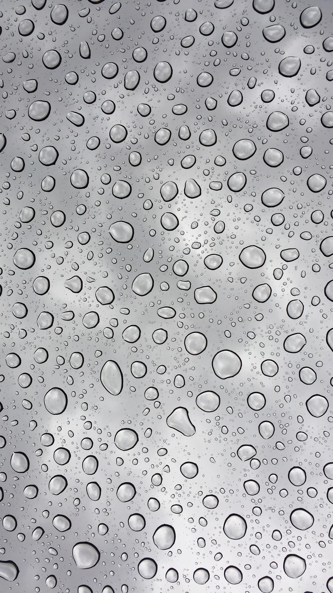 Drops of Rain on Glass